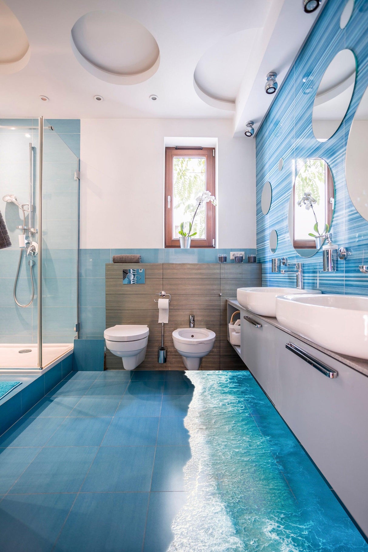Stylish bathroom featuring 3D ocean beach floor decal, enhancing the serene atmosphere with blue tones.