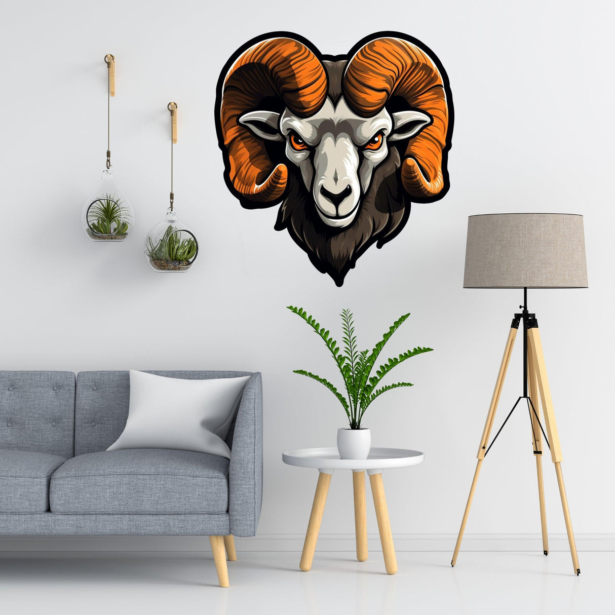 Artistic ram head wall sticker with glossy horns, showcased in a modern living room setting.