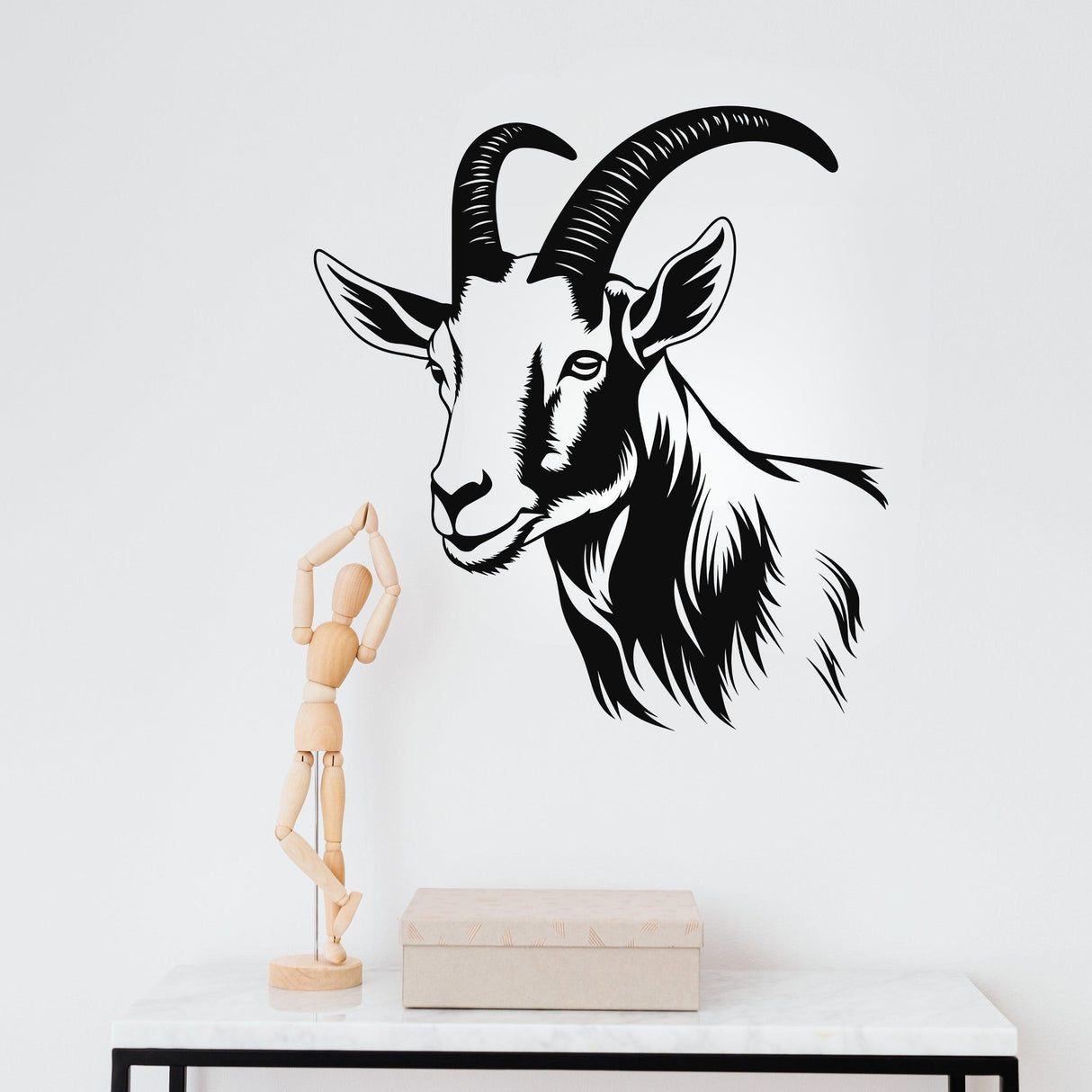 Graceful goat wall decal in black and white, adding tranquility to modern decor.