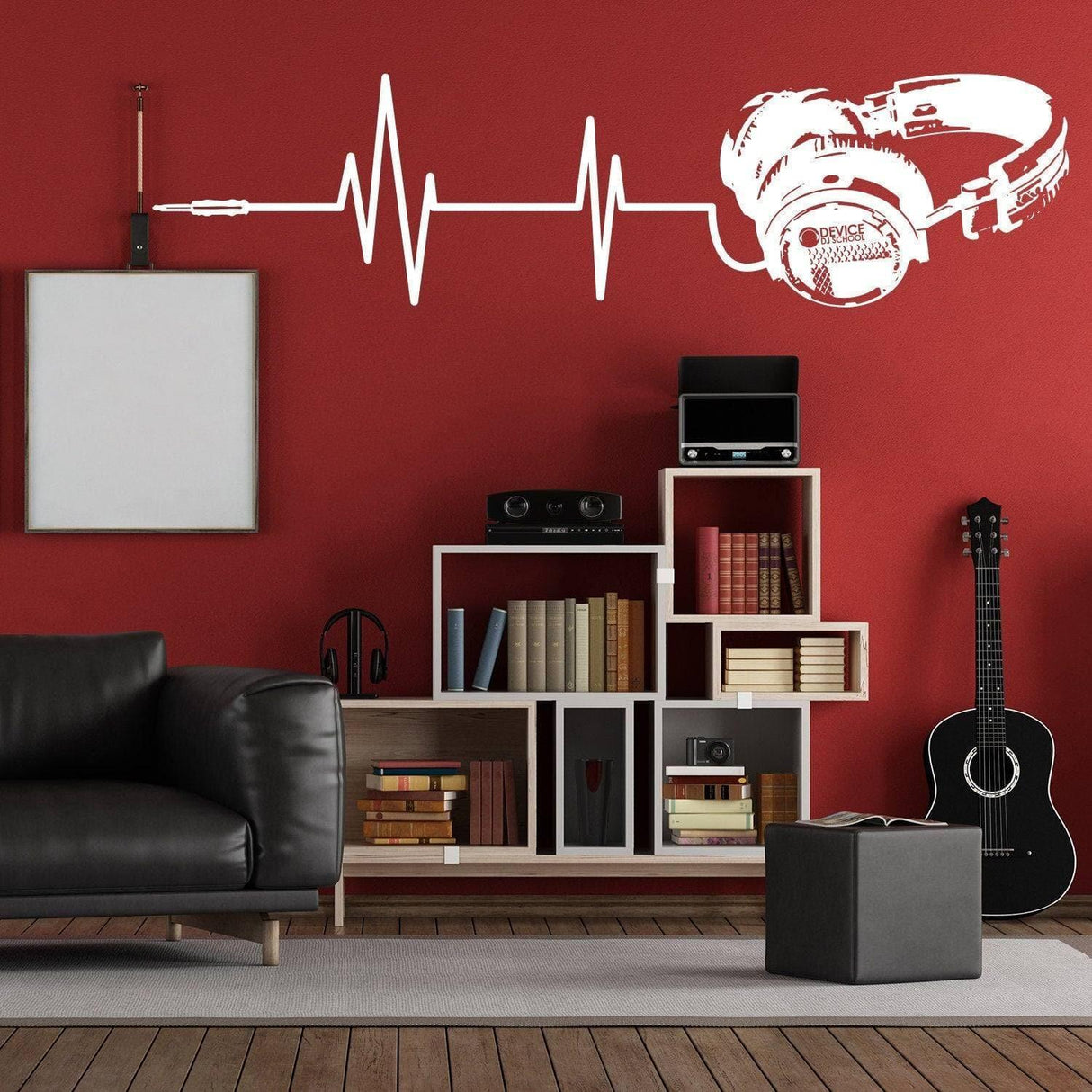 Vinyl music wall decal featuring headphones and sound waves on a red wall in a stylish living room.