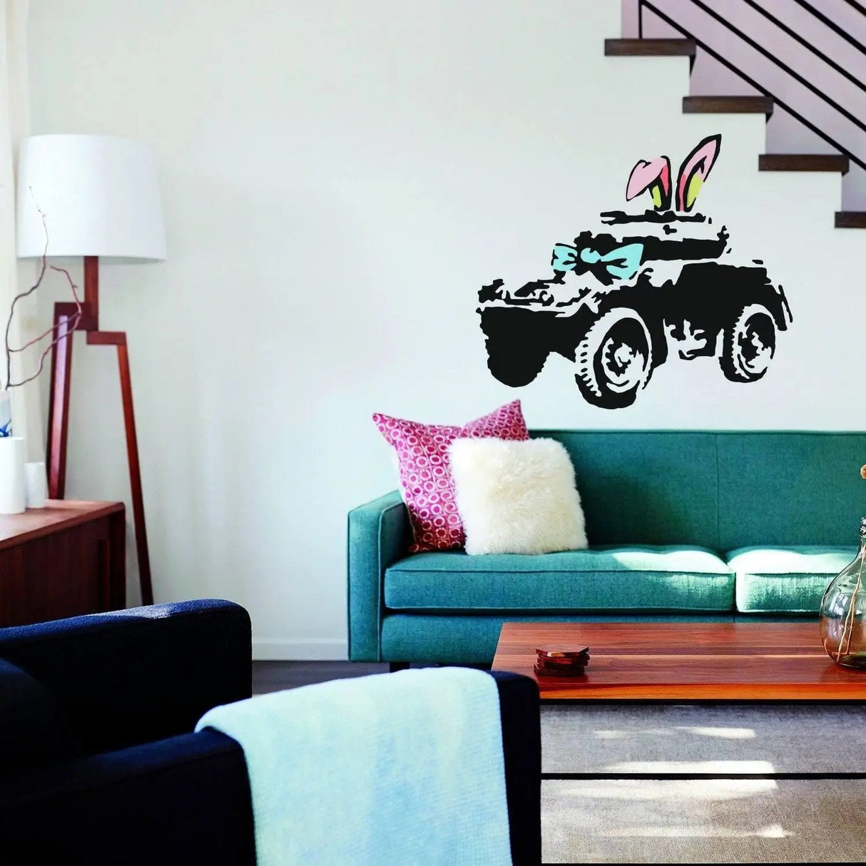 Urban style armored car wall decal with bunny ears and bow on living room wall for cool home decor.