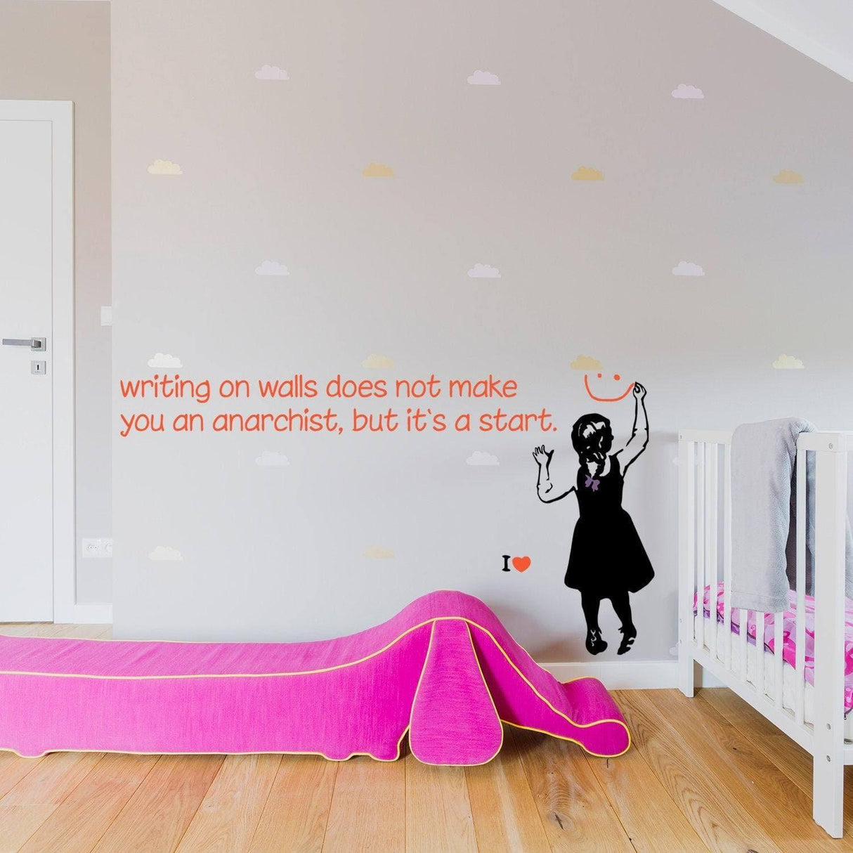 Edgy wall sticker featuring girl with graffiti, showcasing rebellious spirit and artistic flair in a stylish room.