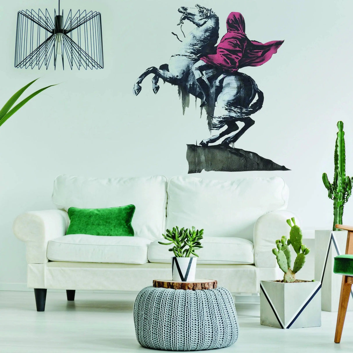 Napoleon vinyl wall art decal in modern living room with sofa, plants, and stylish decor features a horse and rider in vibrant colors.