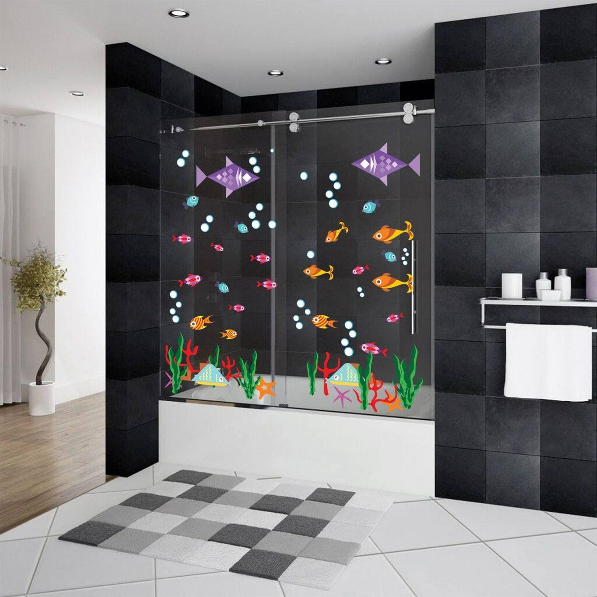 Colorful vinyl fish decals on a shower door, adding whimsy to a modern bathroom.