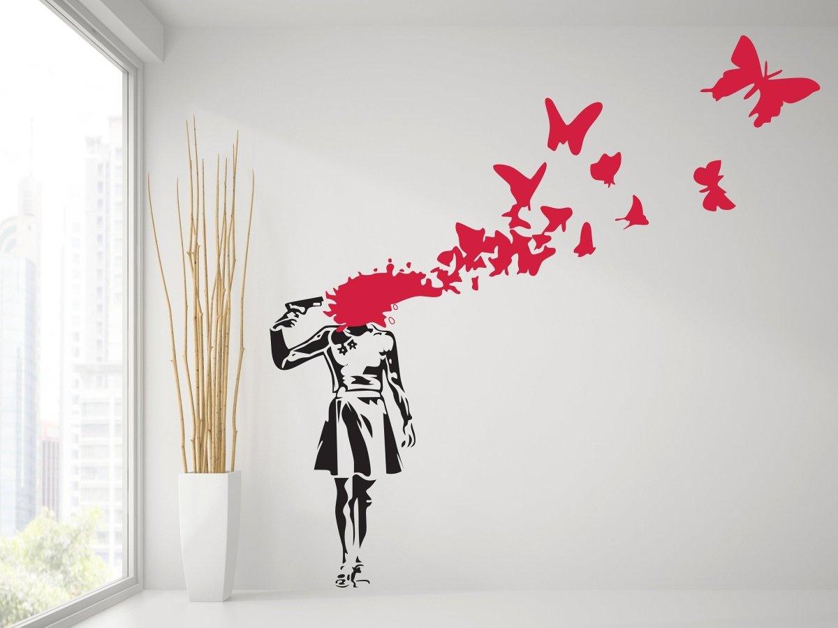Butterfly girl vinyl sticker wall decal showcasing street art with vibrant red butterflies and emotional design.