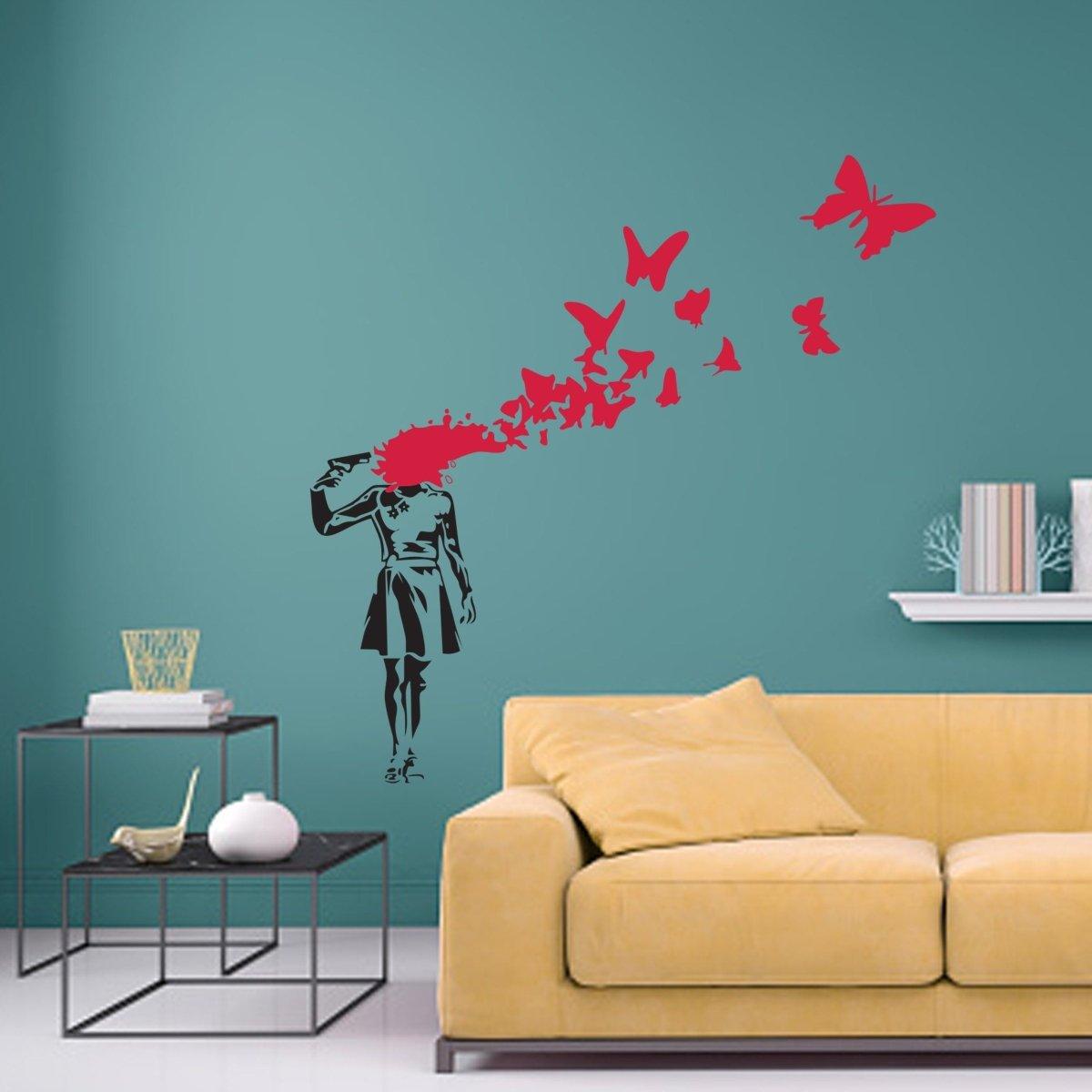 Butterfly Girl vinyl sticker wall decal showcasing a girl with a butterfly explosion above her head in a stylish living room.