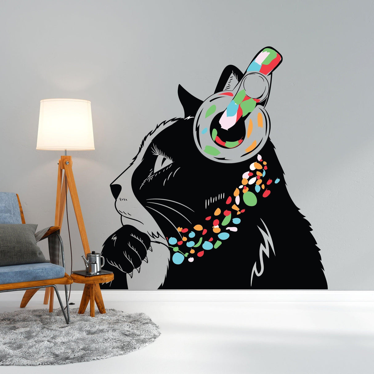 Whimsical cat wall decal with headphones and colorful necklace, perfect for playful home decor.