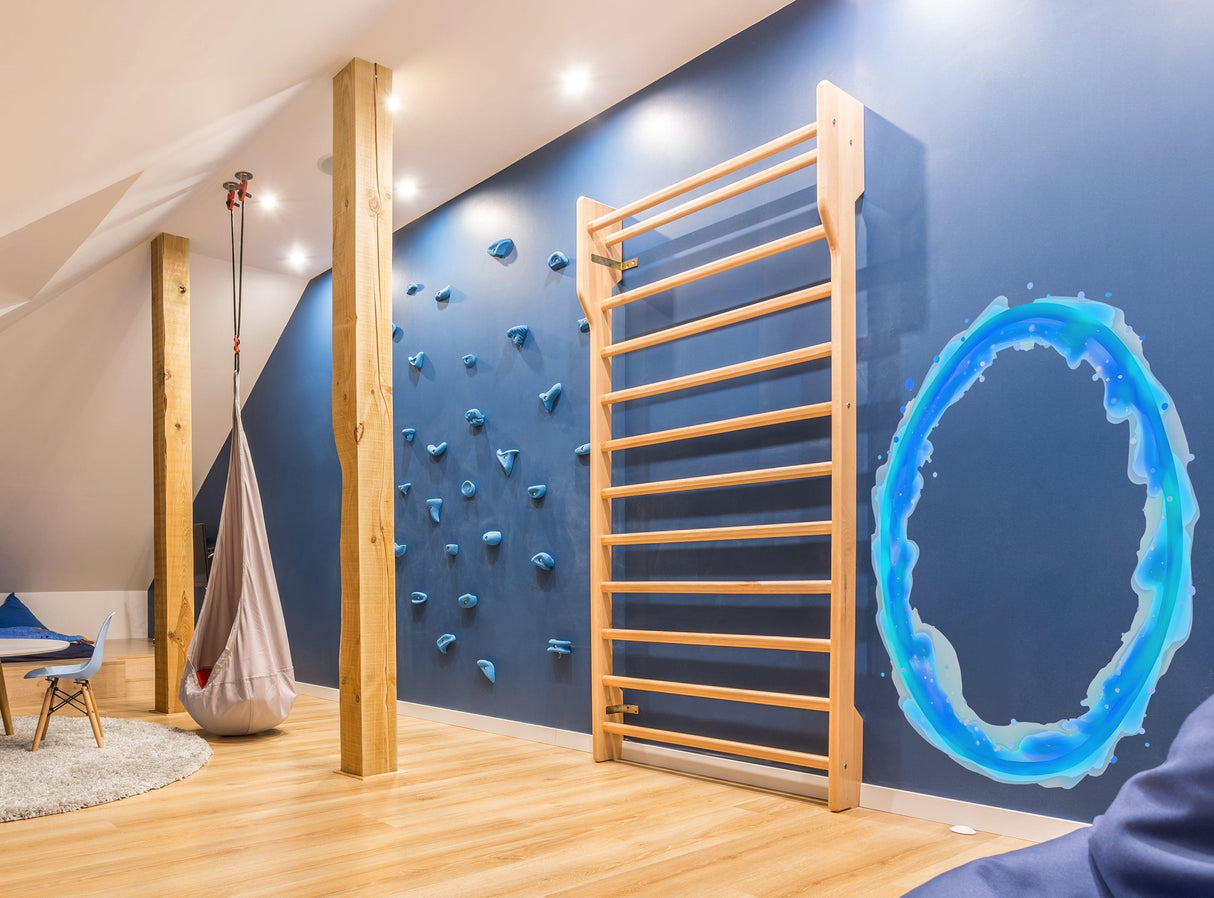 Vibrant blue and orange wall stickers in a children's playroom, featuring climbing holds and a cozy swing.