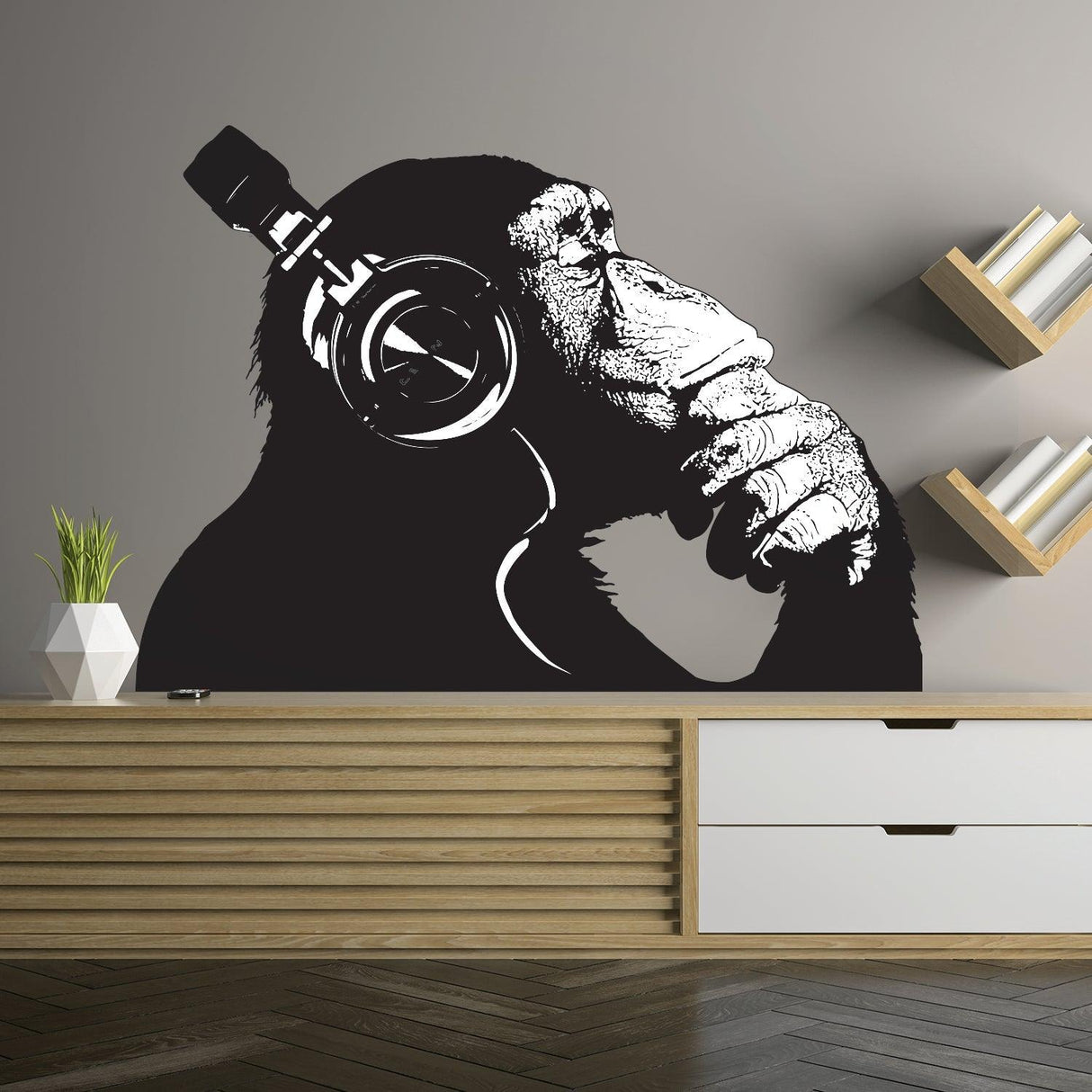 Cool chimp wall decal wearing headphones, perfect for art lovers and music enthusiasts.