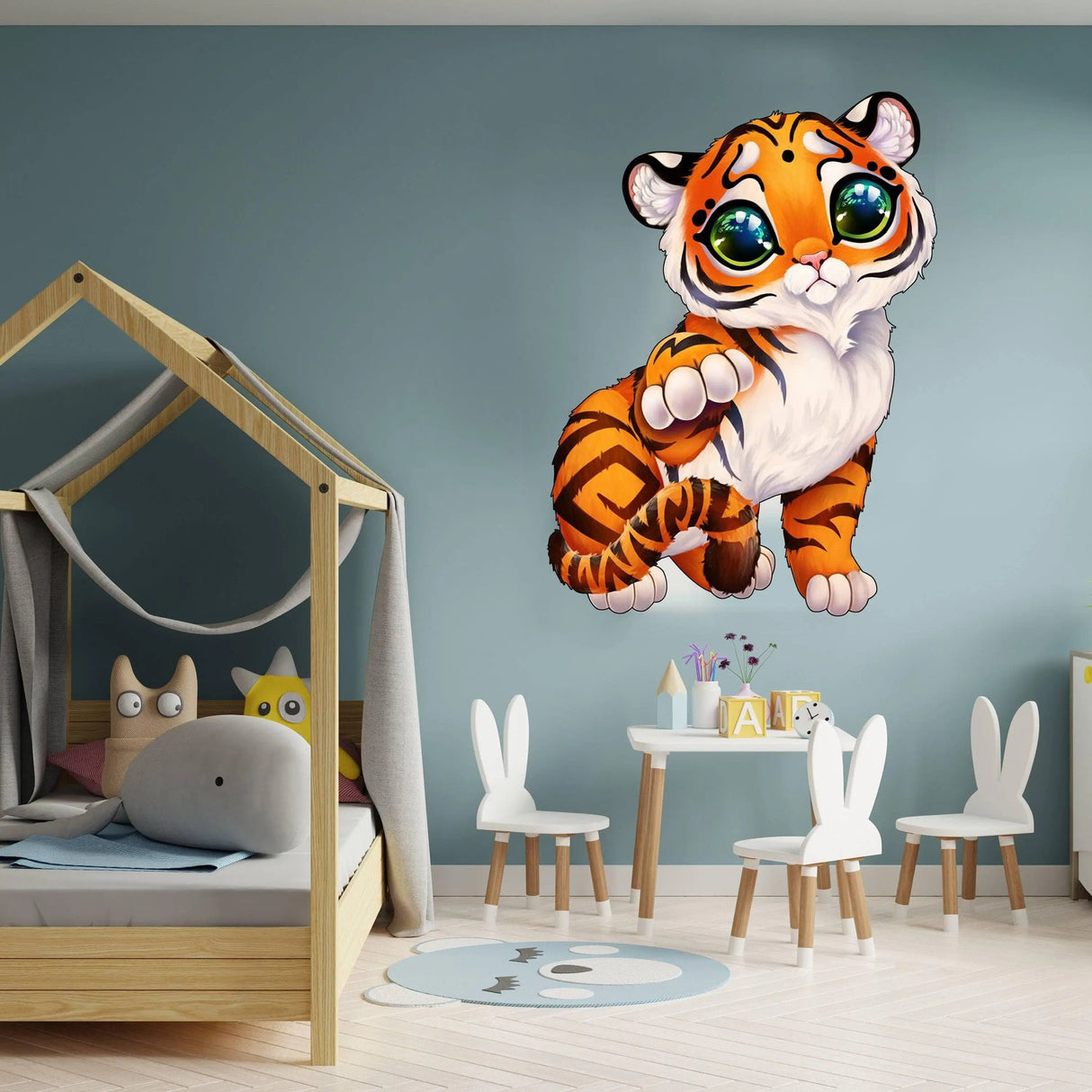 Playful whimsical tiger wall decal in colorful nursery, adding charm and personality to the room.