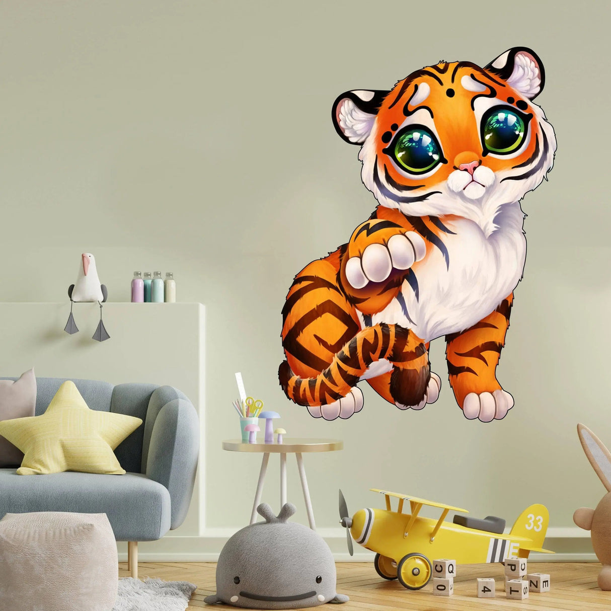 Whimsical tiger wall decal adding playful charm to a bright, cozy nursery or children's room.