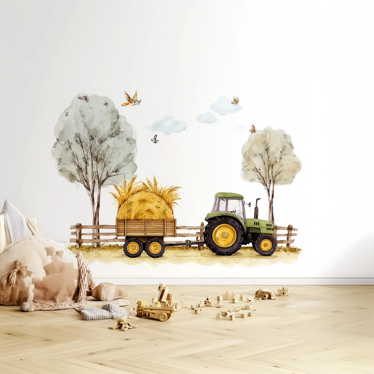 Colorful farm tractor wall decal with trailer of hay, trees, and birds for rustic nursery decor.