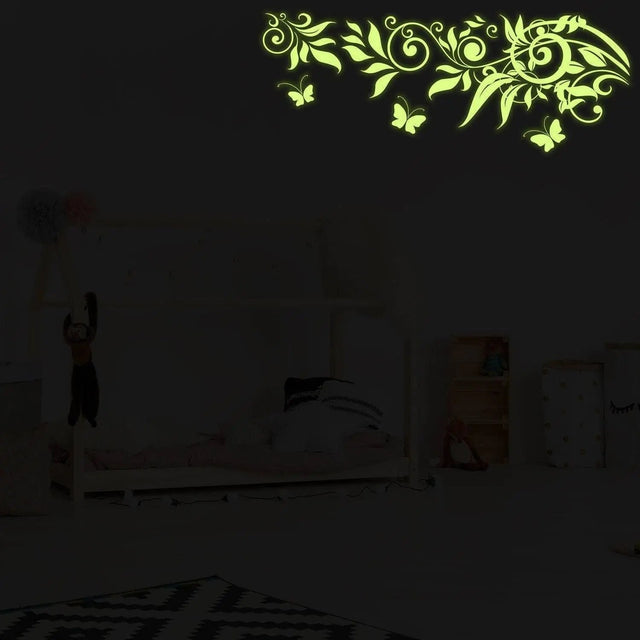 Luminous Blossom Night Wall Sticker glowing in a stylish bedroom, adding a magical touch to home decor.