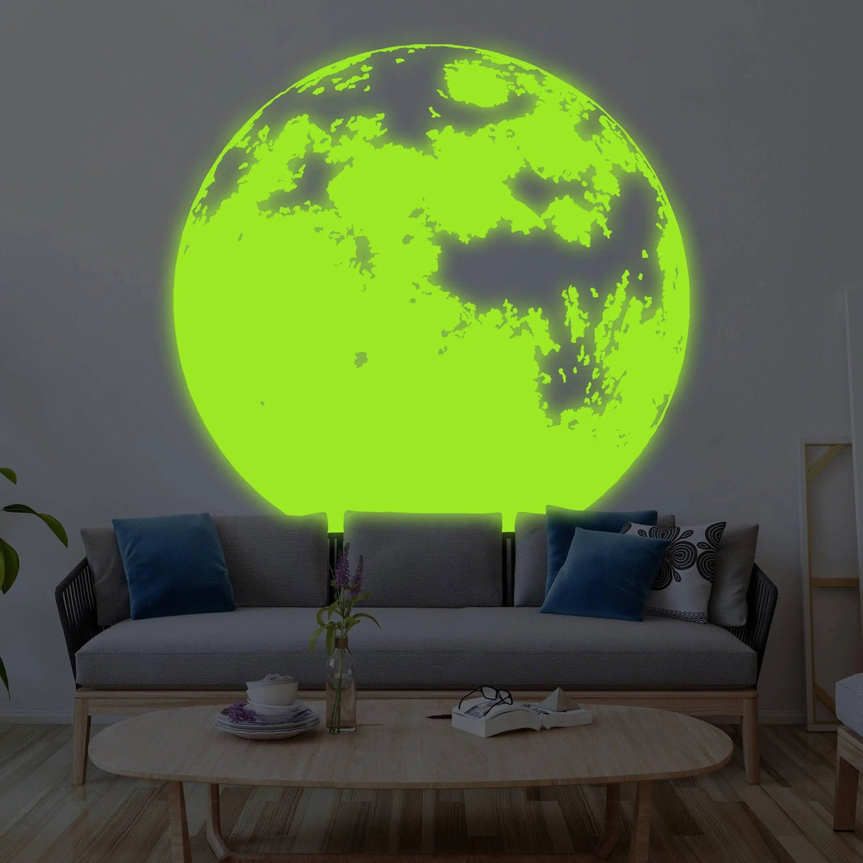 Glowing moon wall decor creating a luminous atmosphere in a stylish living room.