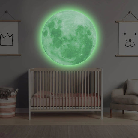 Luminous lunar wall decal illuminating a nursery with glow-in-the-dark moon design, perfect for a child's room.