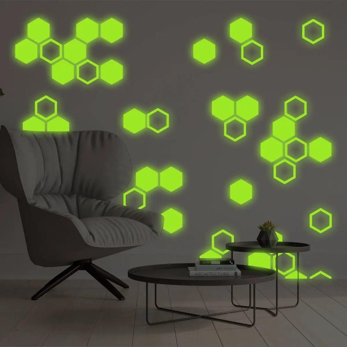 Luminous hexagon glow in the dark wall stickers on a stylish living room wall, creating a vibrant, enchanting atmosphere.