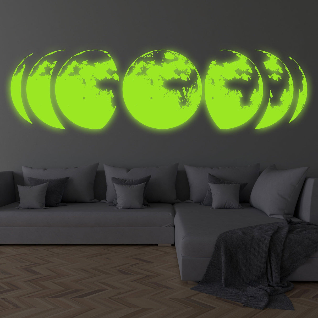 Glow-in wall stickers displaying luminous moon phases above a modern sofa, perfect for enhancing nighttime decor.