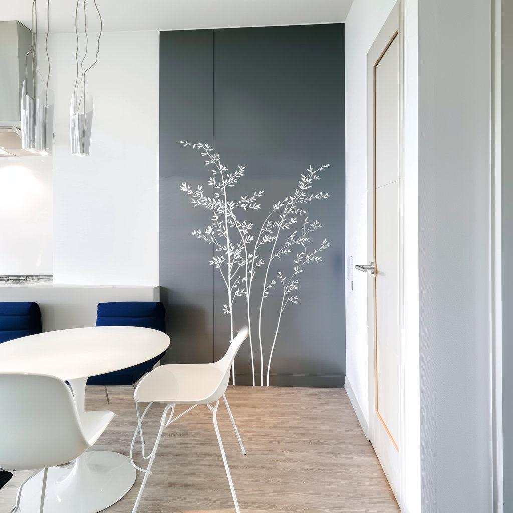 Minimalist white branch wall sticker decal on a dark wall, enhancing modern kitchen decor with nature-inspired elegance.