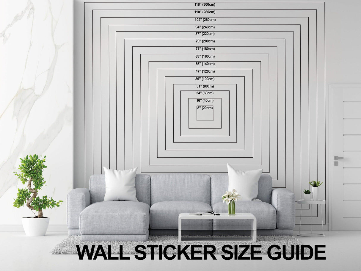 Wall sticker size guide displayed on a wall behind a modern living room couch, helping customers choose sizes.
