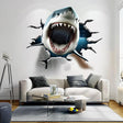3D White Shark wall decal bursting through a wall with open jaws, adding ocean-themed decor to a living room.