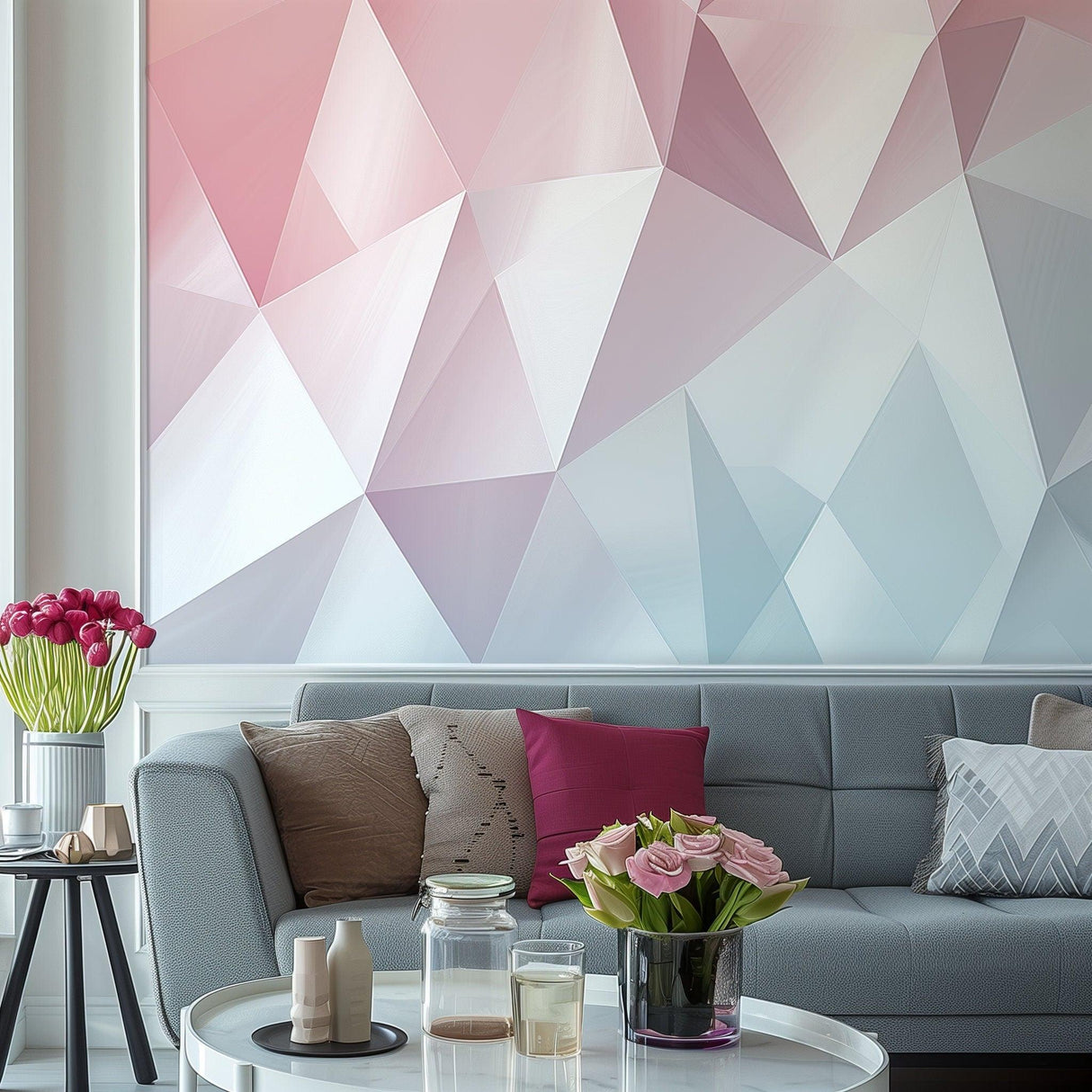 Pastel geometric wall sticker in pink and blue on a modern living room wall with stylish sofa and decor.