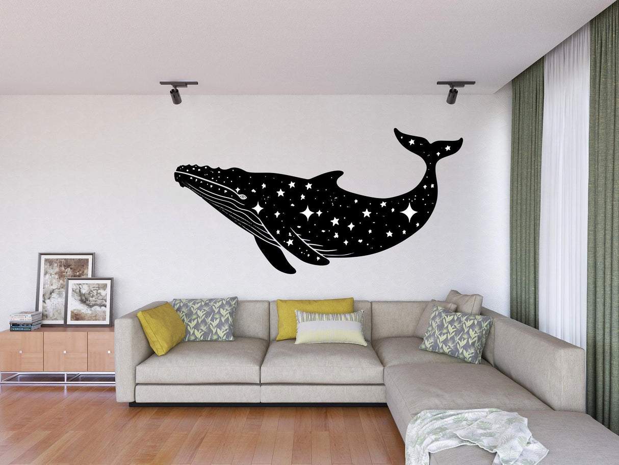 Celestial whale wall sticker in black silhouette with stars, decor for modern living room.