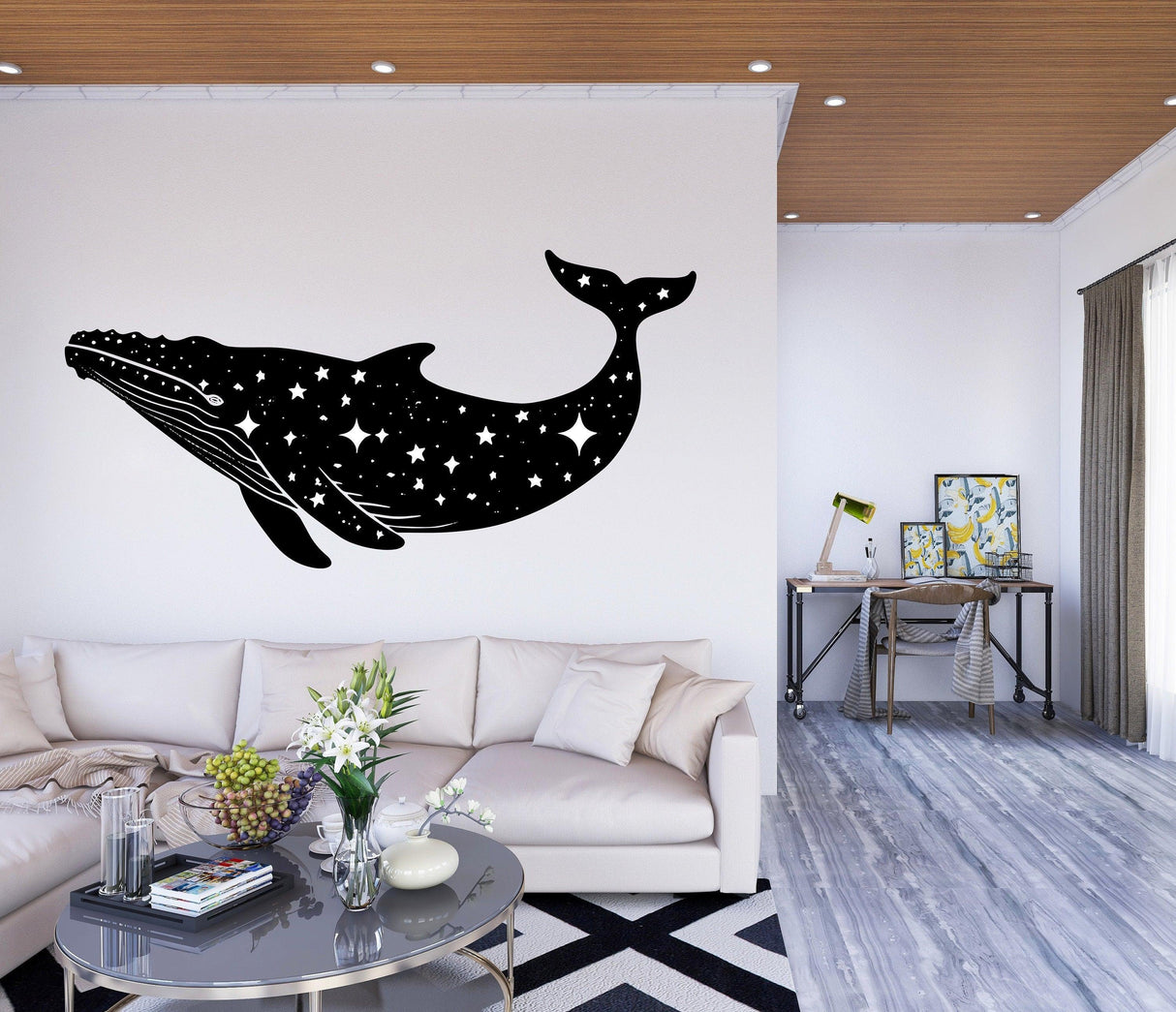 Celestial whale wall sticker in a modern living room, featuring a black silhouette with stars, enhancing decor.