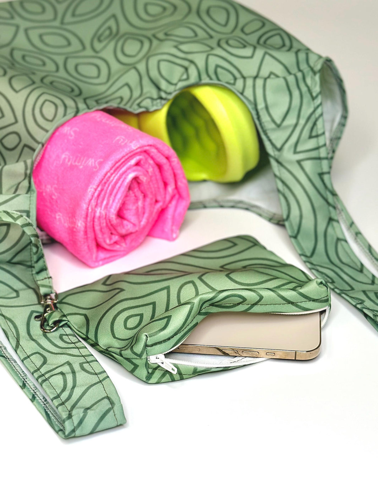 Women's XXL green leaves tote bag with pink towel and matching wallet, perfect for shopping and travel.