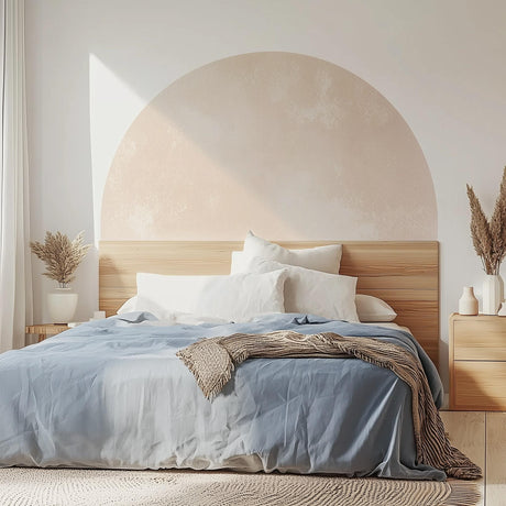 Boho headboard decal in a pastel half-circle design above a minimalist bed with white and blue bedding.
