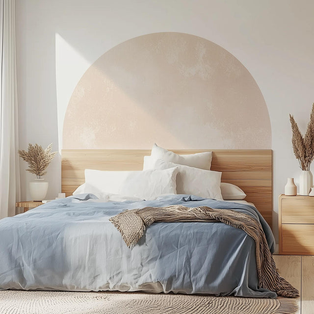 Boho headboard decal in a pastel half-circle design above a minimalist bed with white and blue bedding.