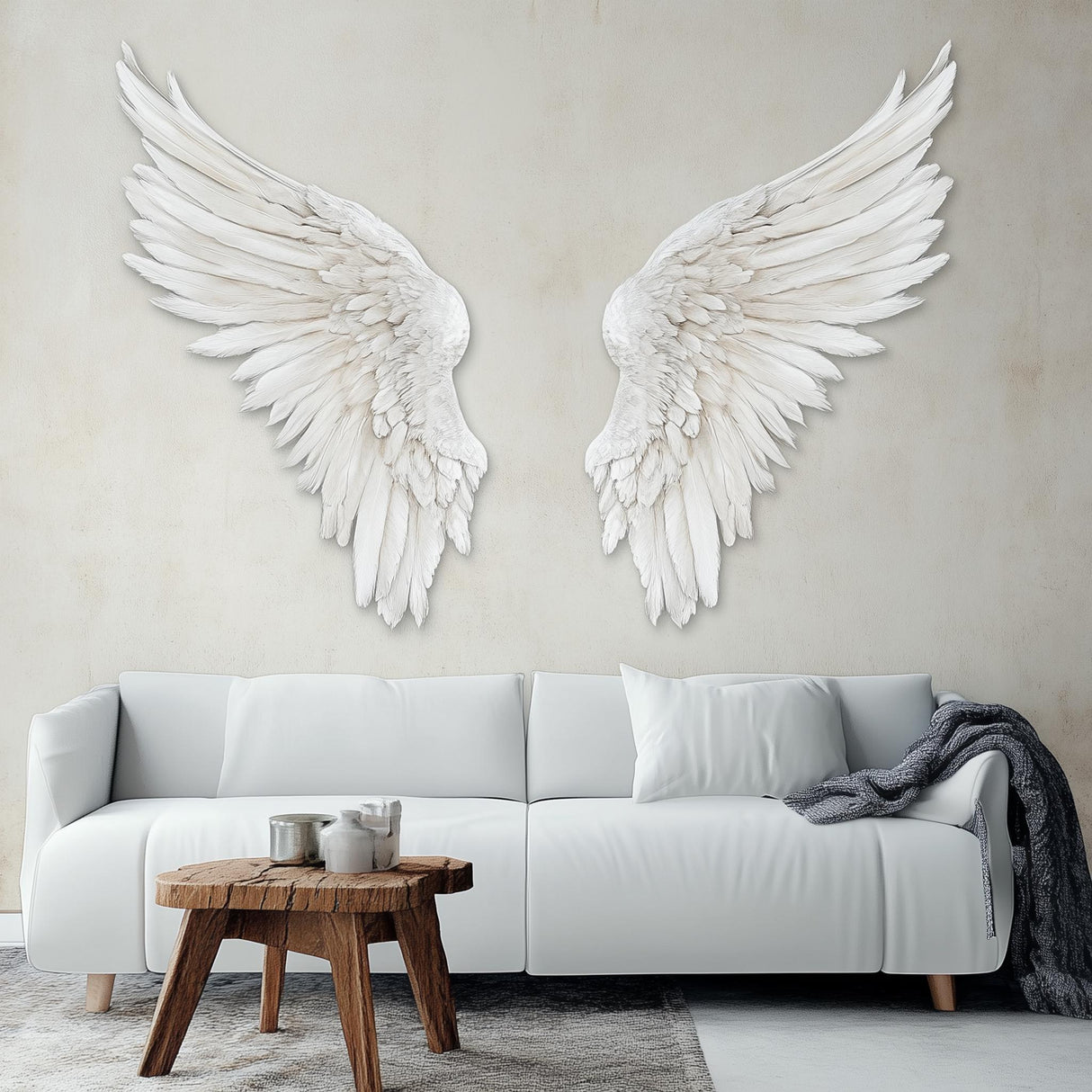 Large 3D angel wings wall decal in white, adding elegance to a modern living room decor.