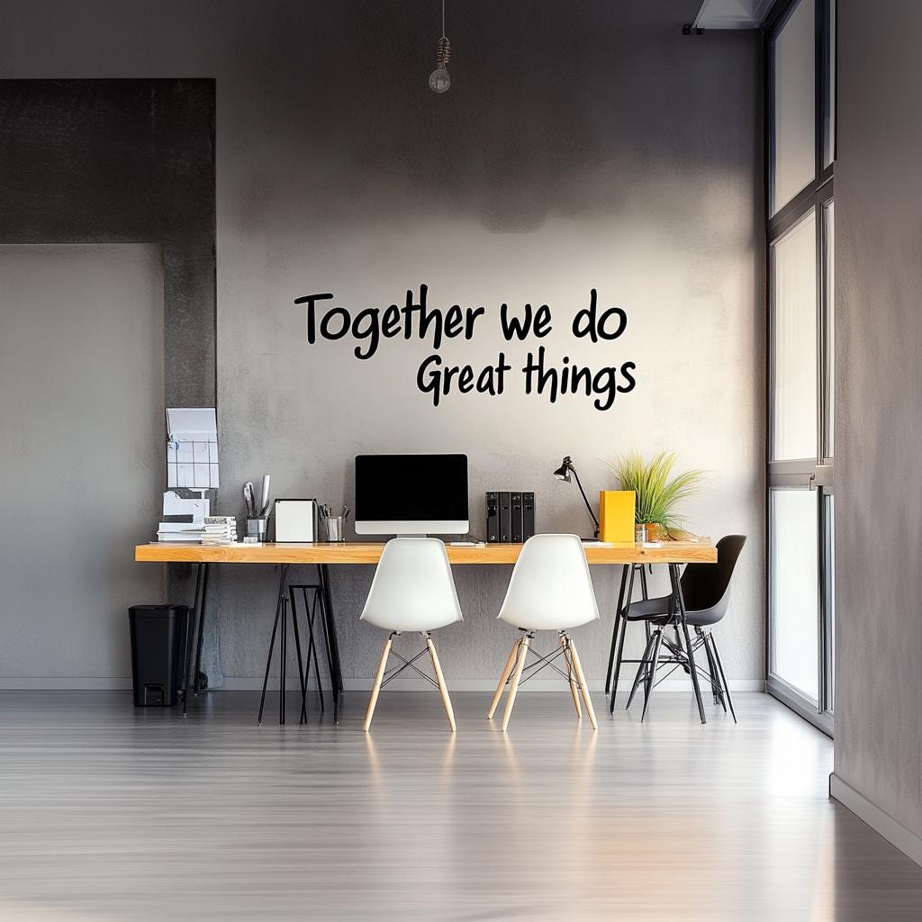 Office workspace featuring 'Together We Do Great Things' wall decal for motivational teamwork decor.