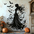 Witch silhouette wall decal with bats, perfect for Halloween decor in living room or bedroom.