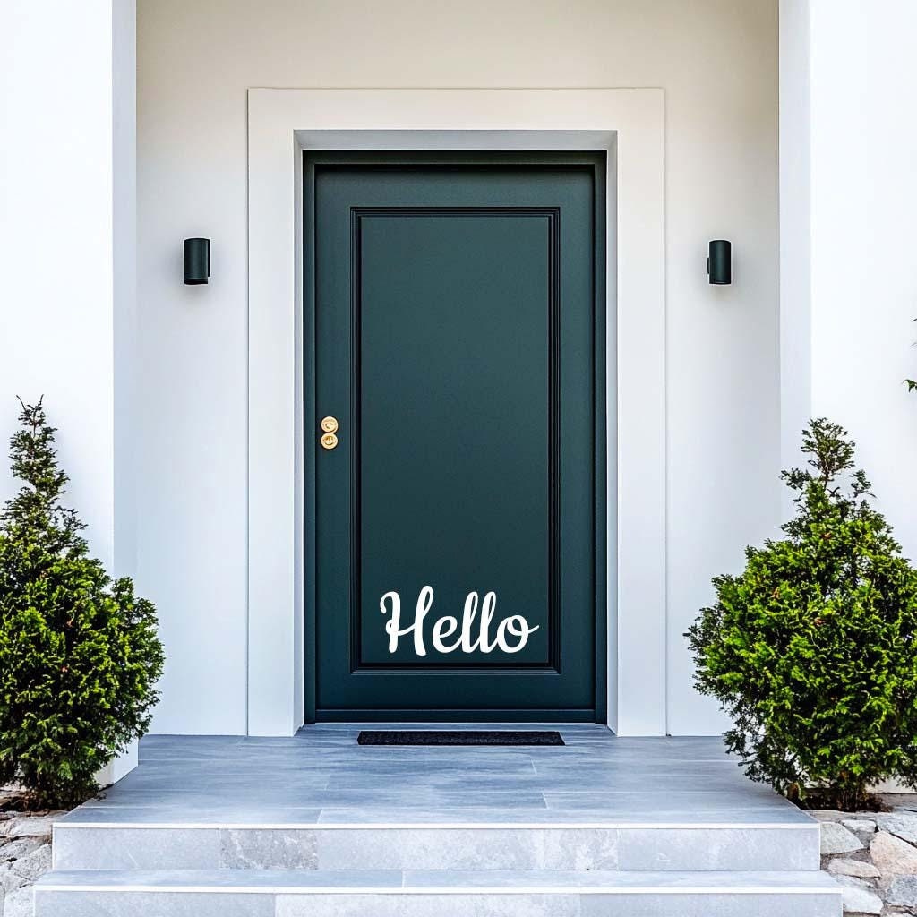 Charming hello front door decal on a dark door, enhancing the entrance with a welcoming touch.