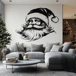Minimalist black Santa Claus wall mural in a stylish living room with cozy decor, perfect for holiday cheer.