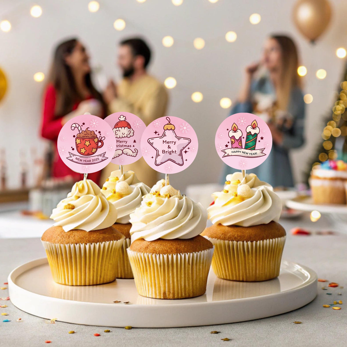 Festive cupcakes topped with pink Christmas stickers, perfect for holiday gatherings and celebrations.