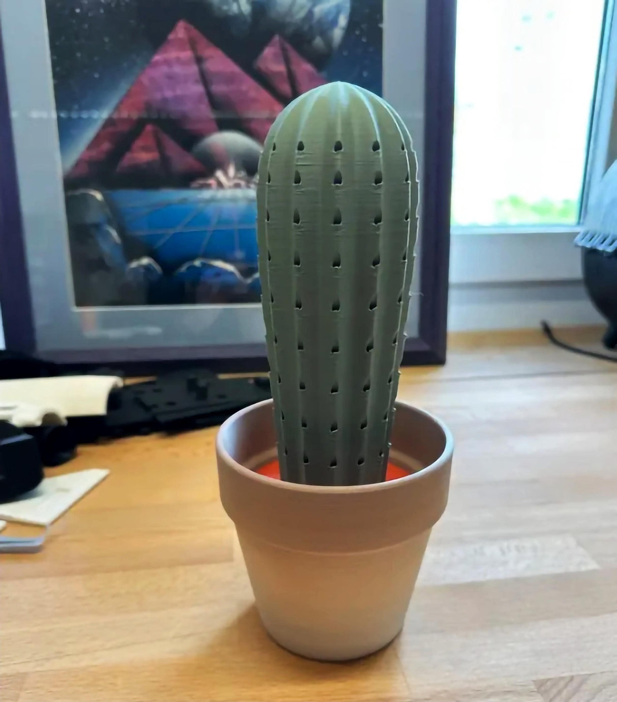3D printed cactus toothpick holder in a pot, perfect for cheese and fruit boards, adds fun decor to any table.
