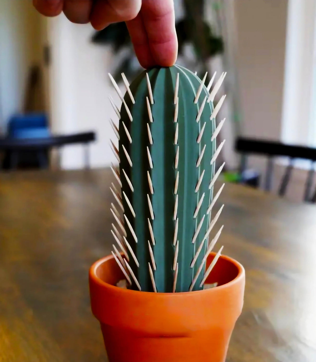 3D printed cactus toothpick holder with toothpicks resembling cactus spines, perfect for parties and charcuterie boards.