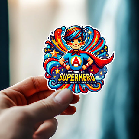 My Child Is a Superhero autism sticker held in hand, featuring a colorful superhero design, perfect for awareness.