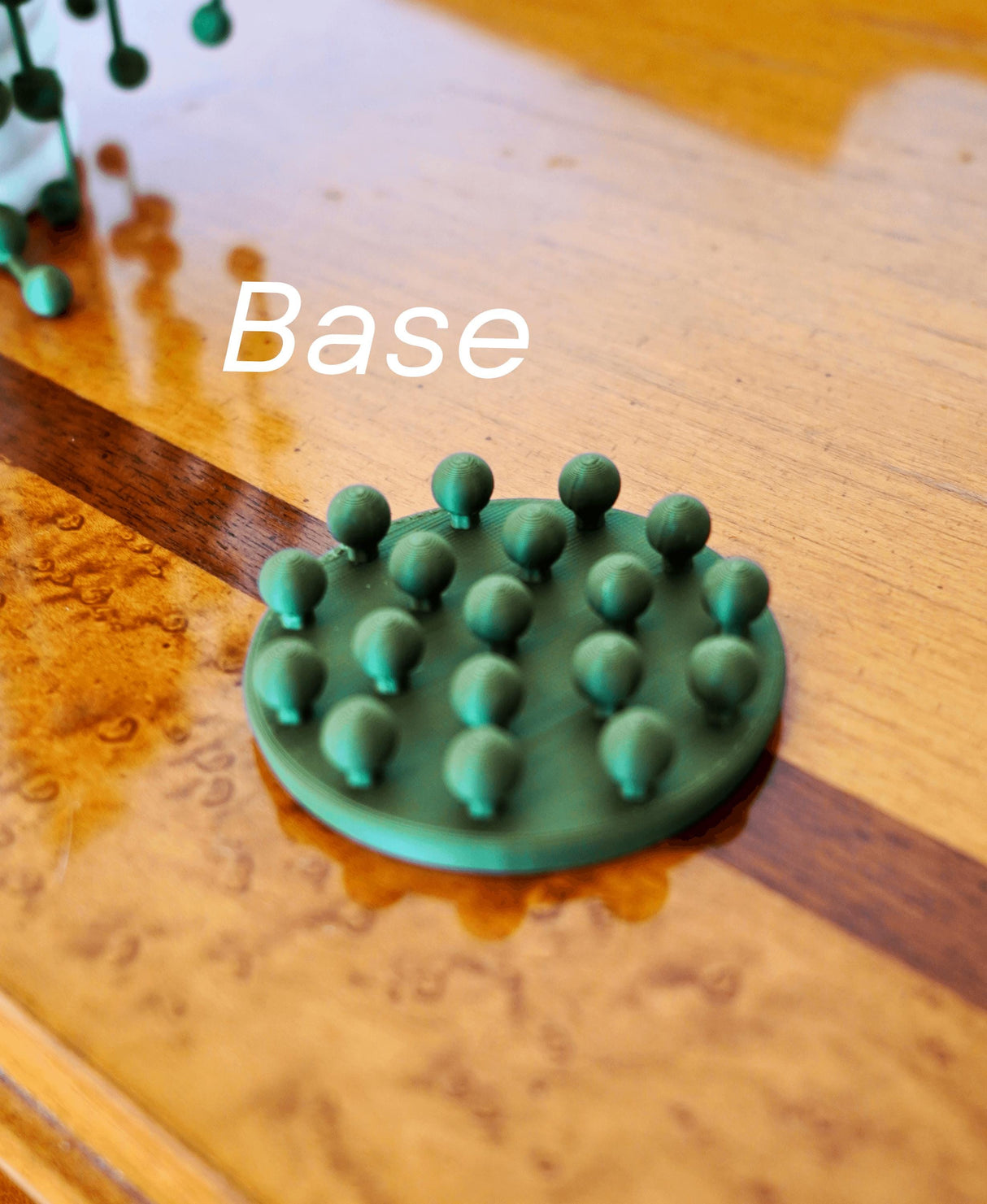Base for customizable 3D-printed String of Pearls plant, featuring ball-and-socket design for easy assembly.