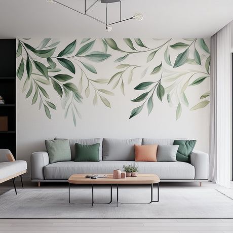 Leaf wall decal with watercolor greenery design above a cozy living room sofa, enhancing natural decor.