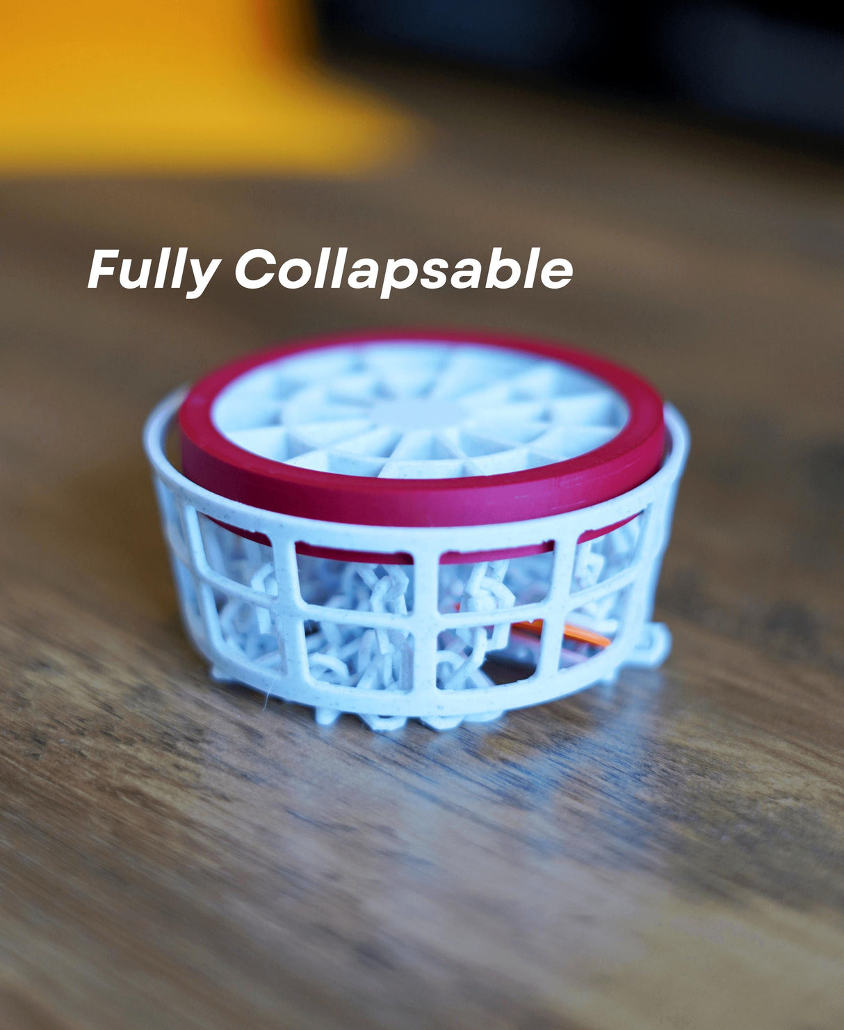 Collapsible mini disc golf basket designed for desktop play, perfect for trick shot challenges and traveling.