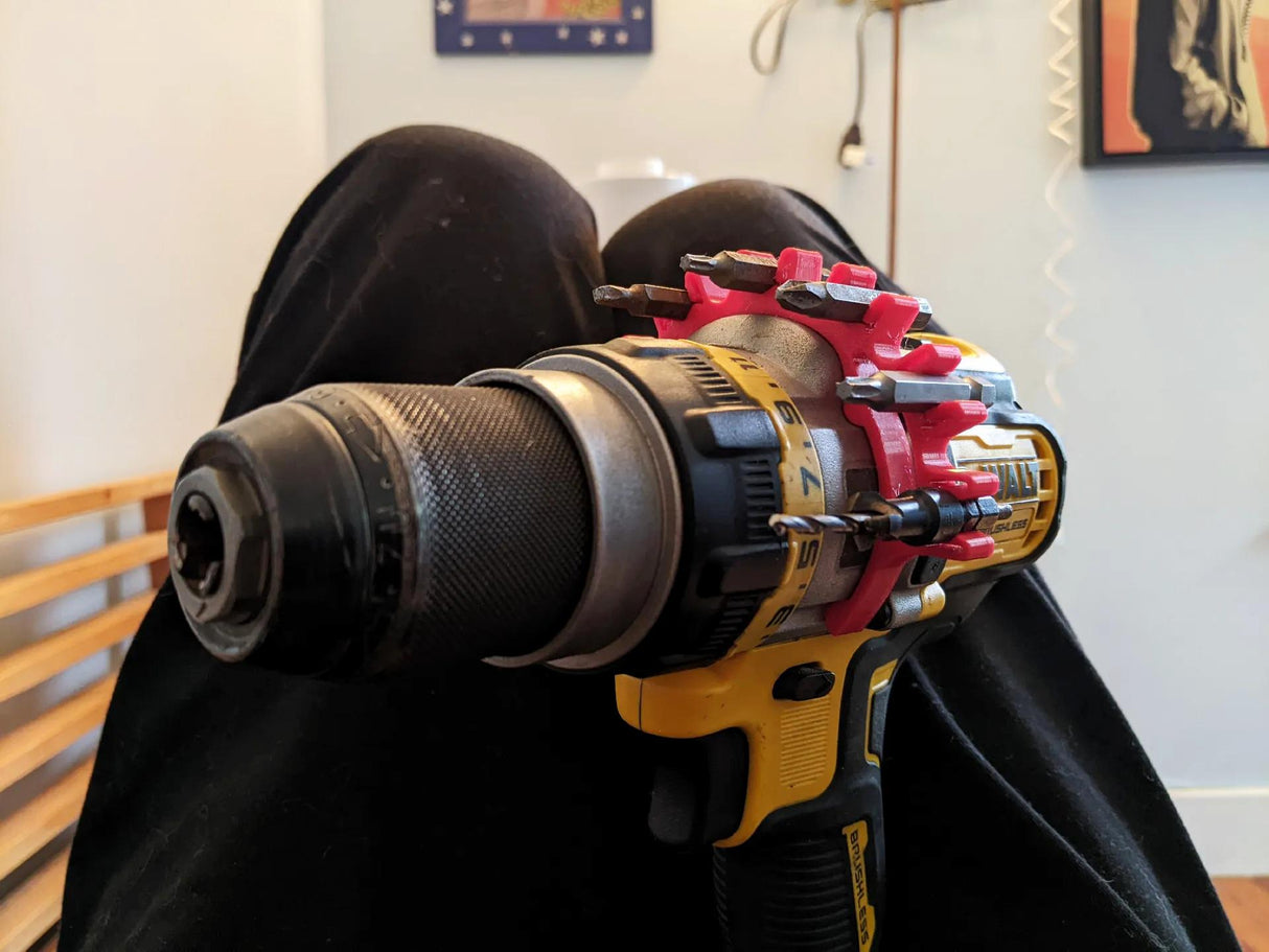 3D printed drill bit holder clip securely attached to a power drill for organized bit storage and easy access.