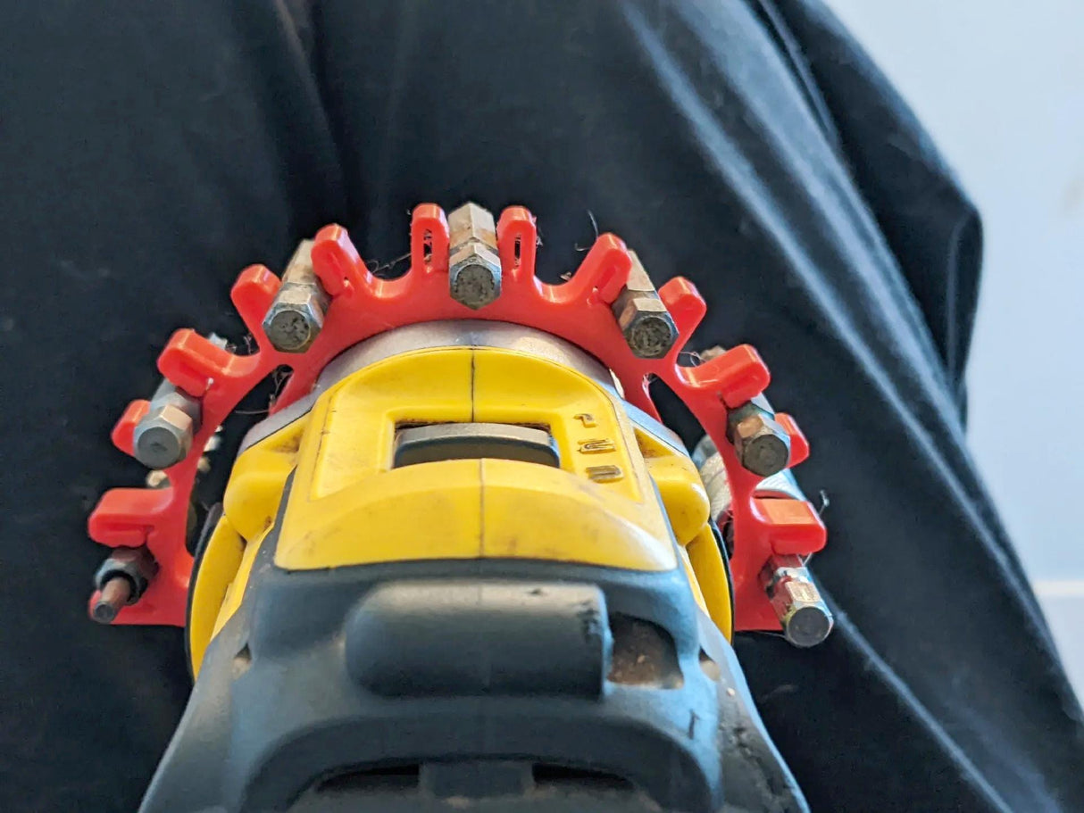 3D printed drill bit holder clip attached to a power drill, keeping bits organized and accessible for efficient work.