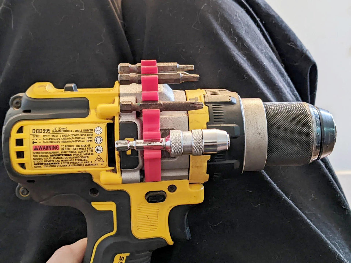 3D printed drill bit holder clip attached to a power drill, keeping drill bits organized and accessible.
