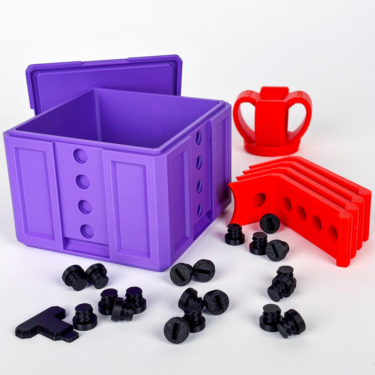 Colorful 3D-printed Annoying Gift Box with bolts and colorful pieces for a fun puzzle challenge.