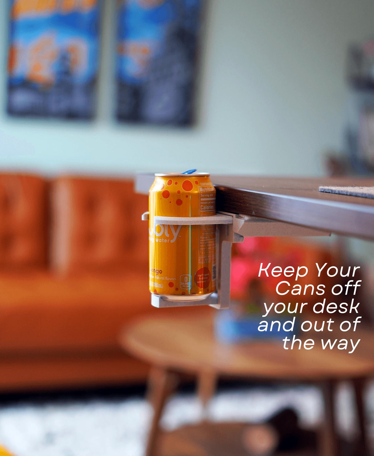 Fold-out under desk cup holder with a can, designed to keep your workspace tidy and drinks accessible.