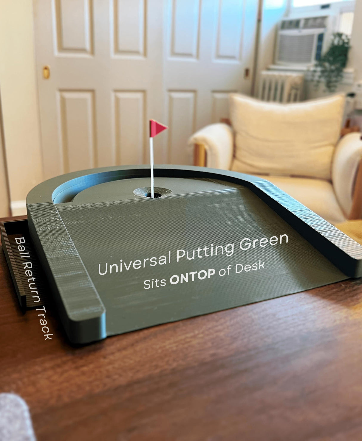 Desktop golf game with ball return, compact putting green for desk, perfect for home or office golf enthusiasts.