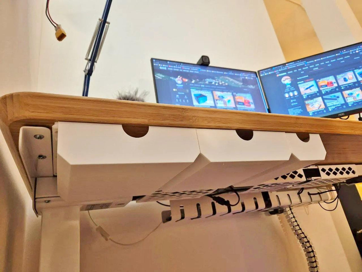 Under desk drawer organizer for minimalist workspace with hidden storage and dual monitors.