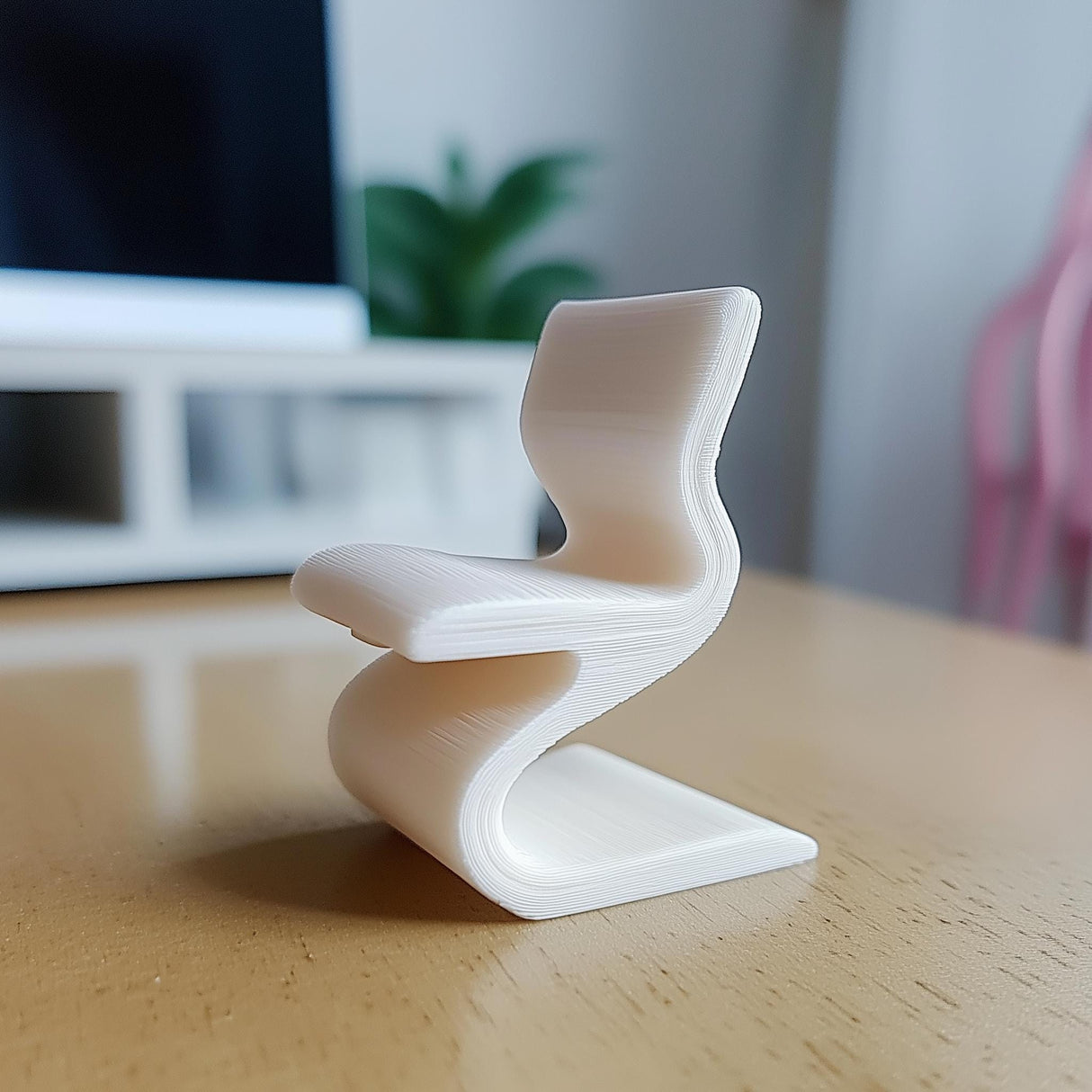 Miniature 1:12 scale modern wiggle chair in white, inspired by Gehry design, for dollhouse decor.